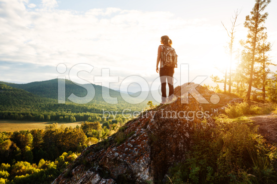 stock-photo-21547580-young-woman-trekking-1.jpg